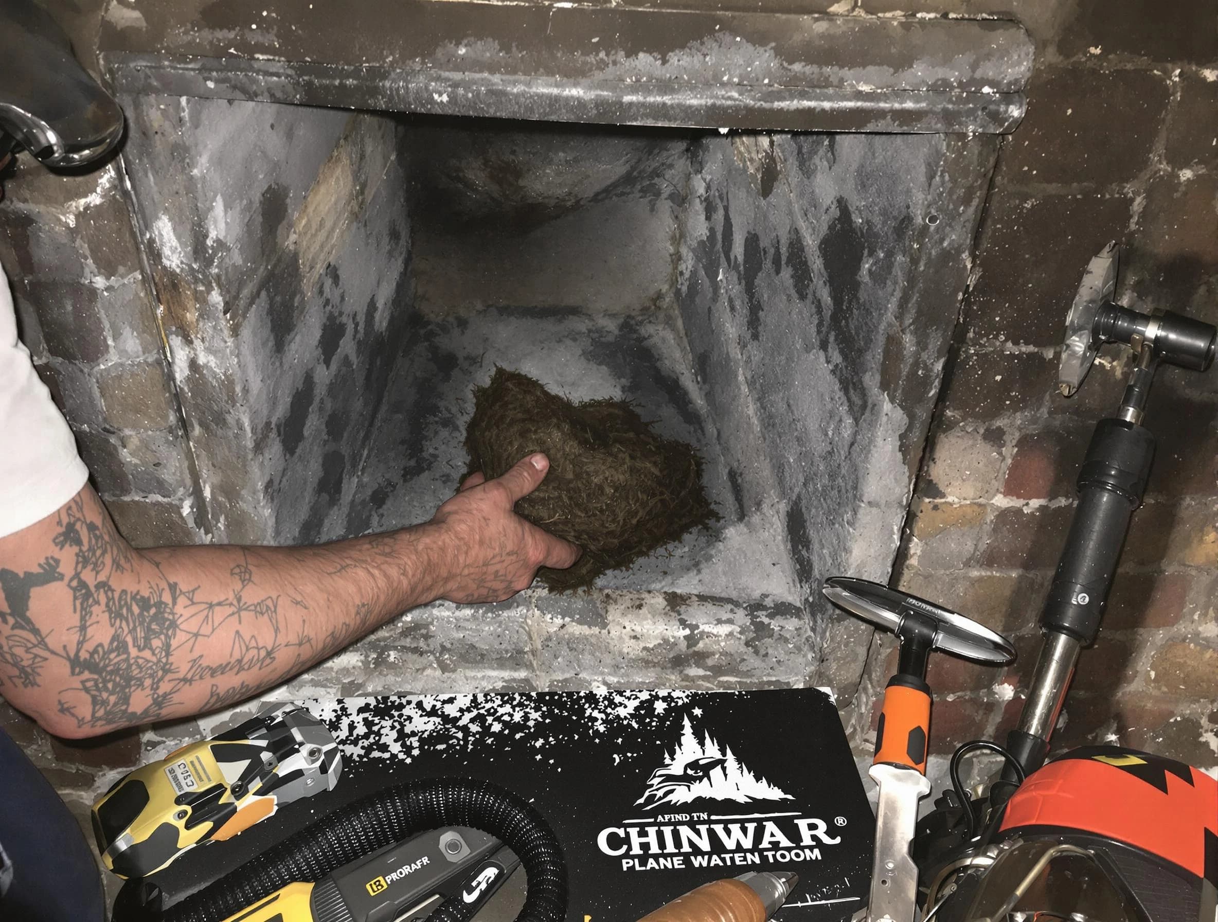 Brentwood Chimney Sweep safely removing debris and screening chimney in Brentwood, TN